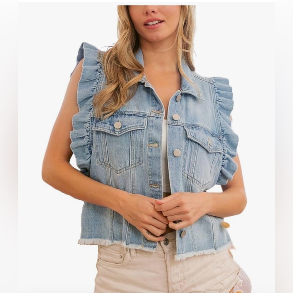 Cute denim vest with ruffle details at arms. Lightweight but is 100% cotton!